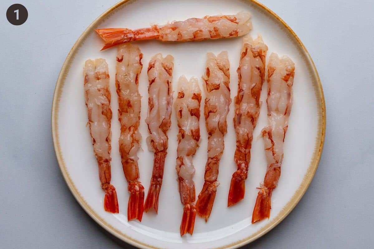 Cleaned and peeled shrimp on a plate