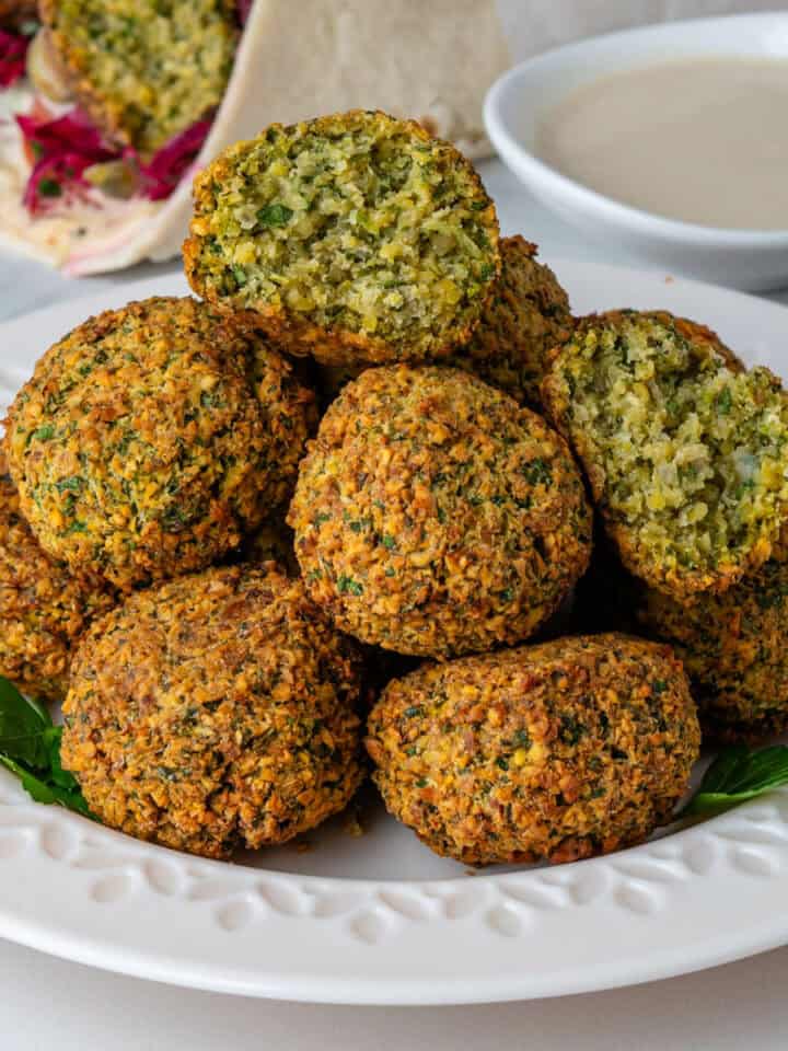 Air Fryer Falafel with one ball cut in half to show the inside