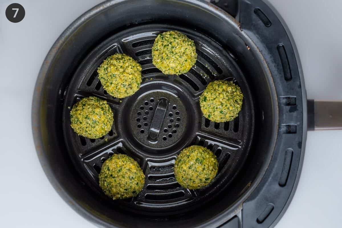 Falafel balls in the air fryer before being cooked