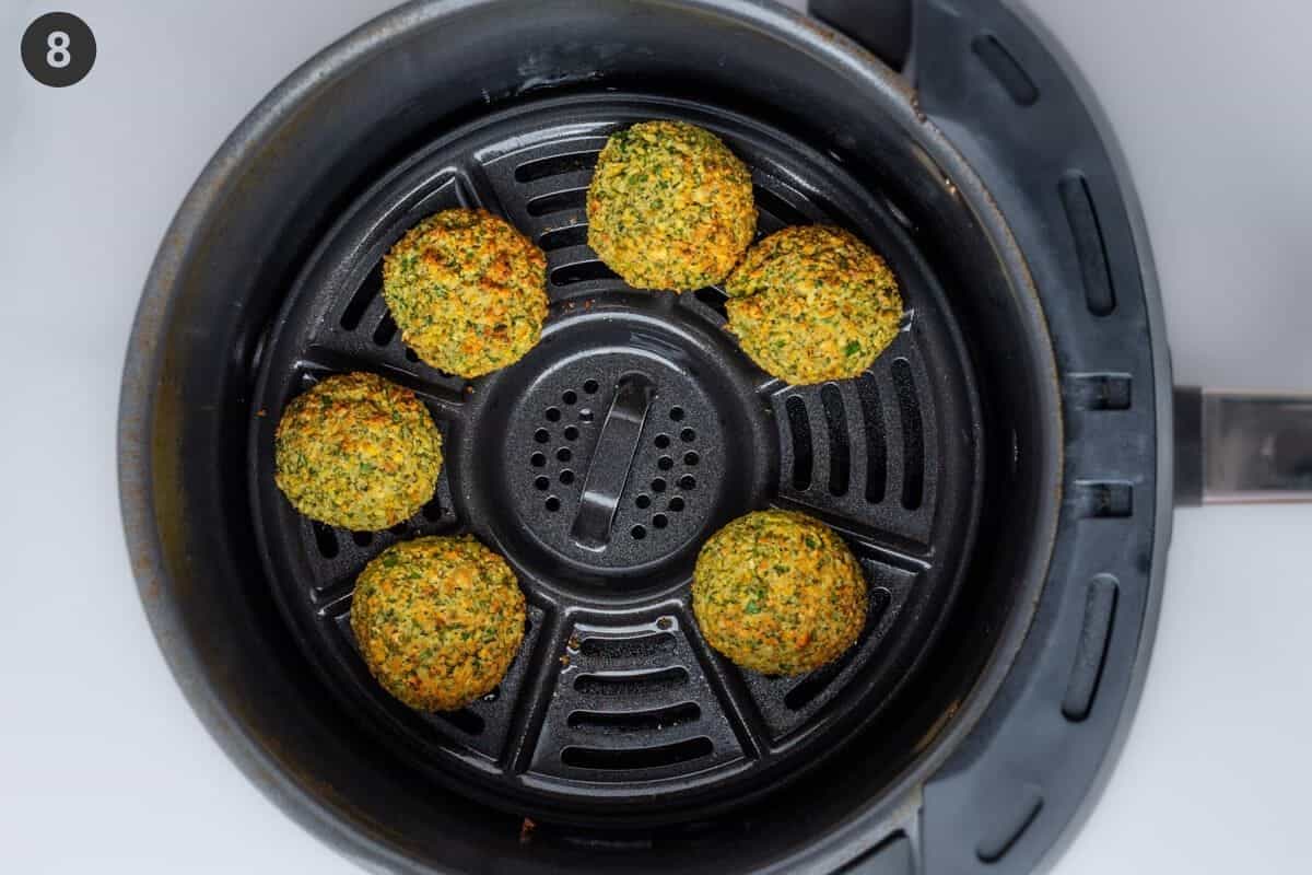 Falafel balls mixed half way during cook