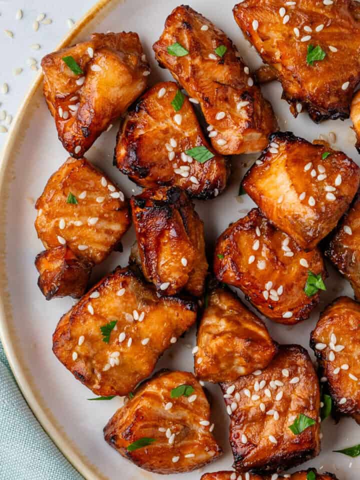 Air fryer salmon bites with sesame seeds on top