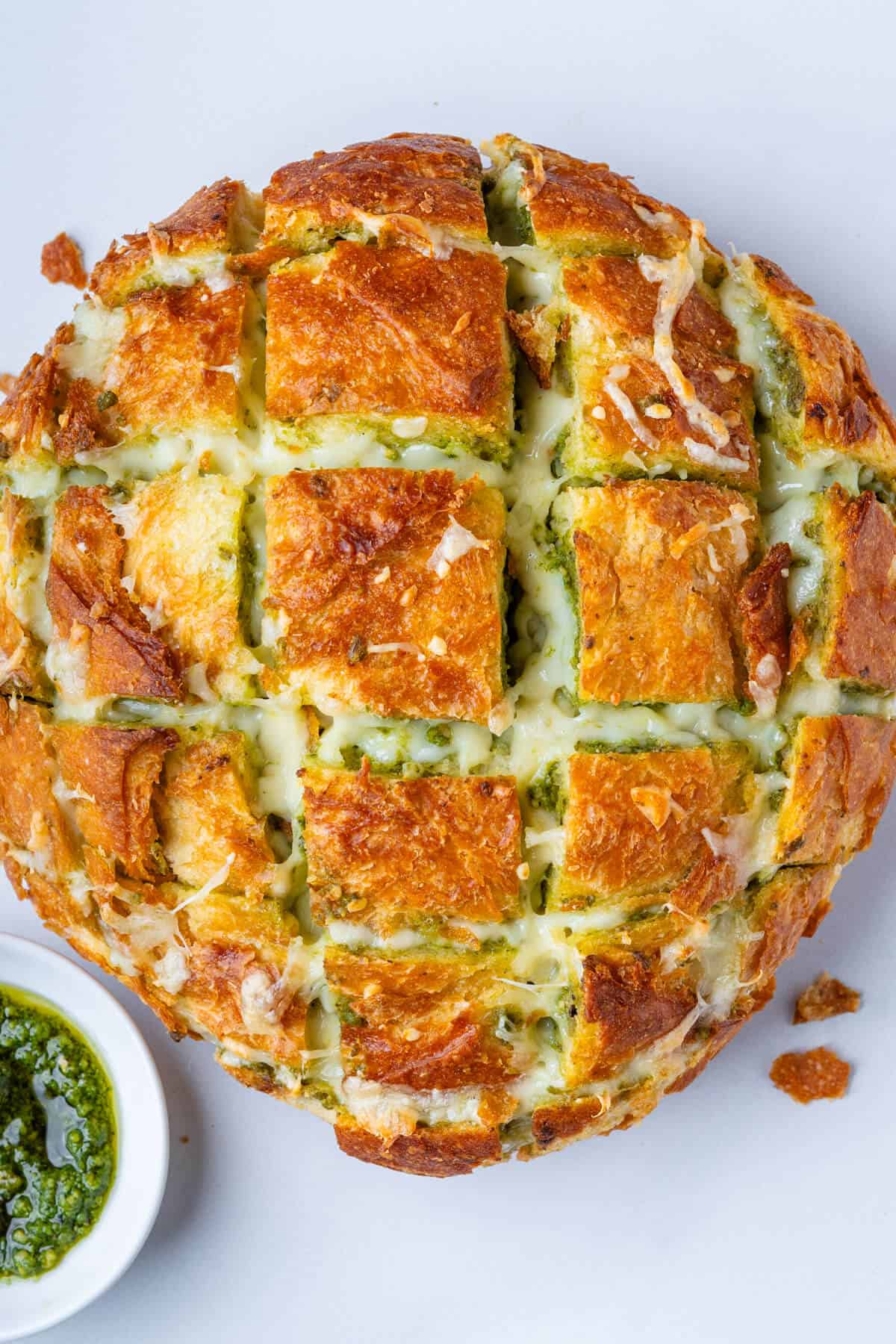 Baked cheesy pesto pull apart bread