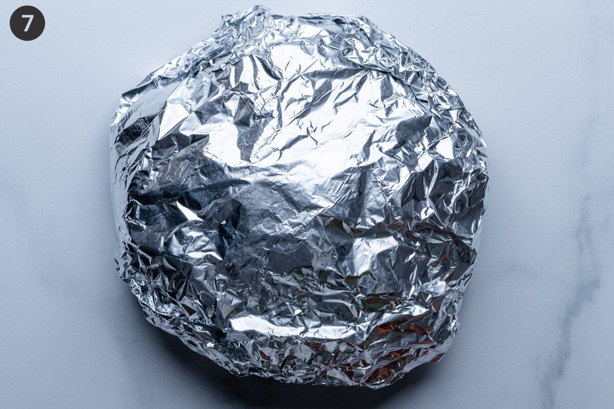 Bread loaf wrapped in foil ready to bake