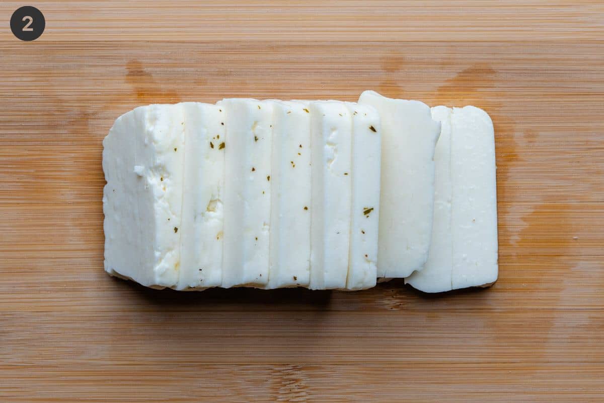 Halloumi pieces sliced on a cutting board