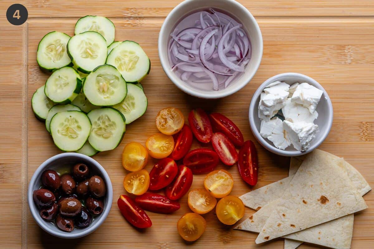 Bowl ingredients prepared on a cutting board