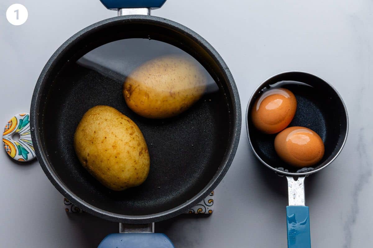 Potatoes and eggs being boiled