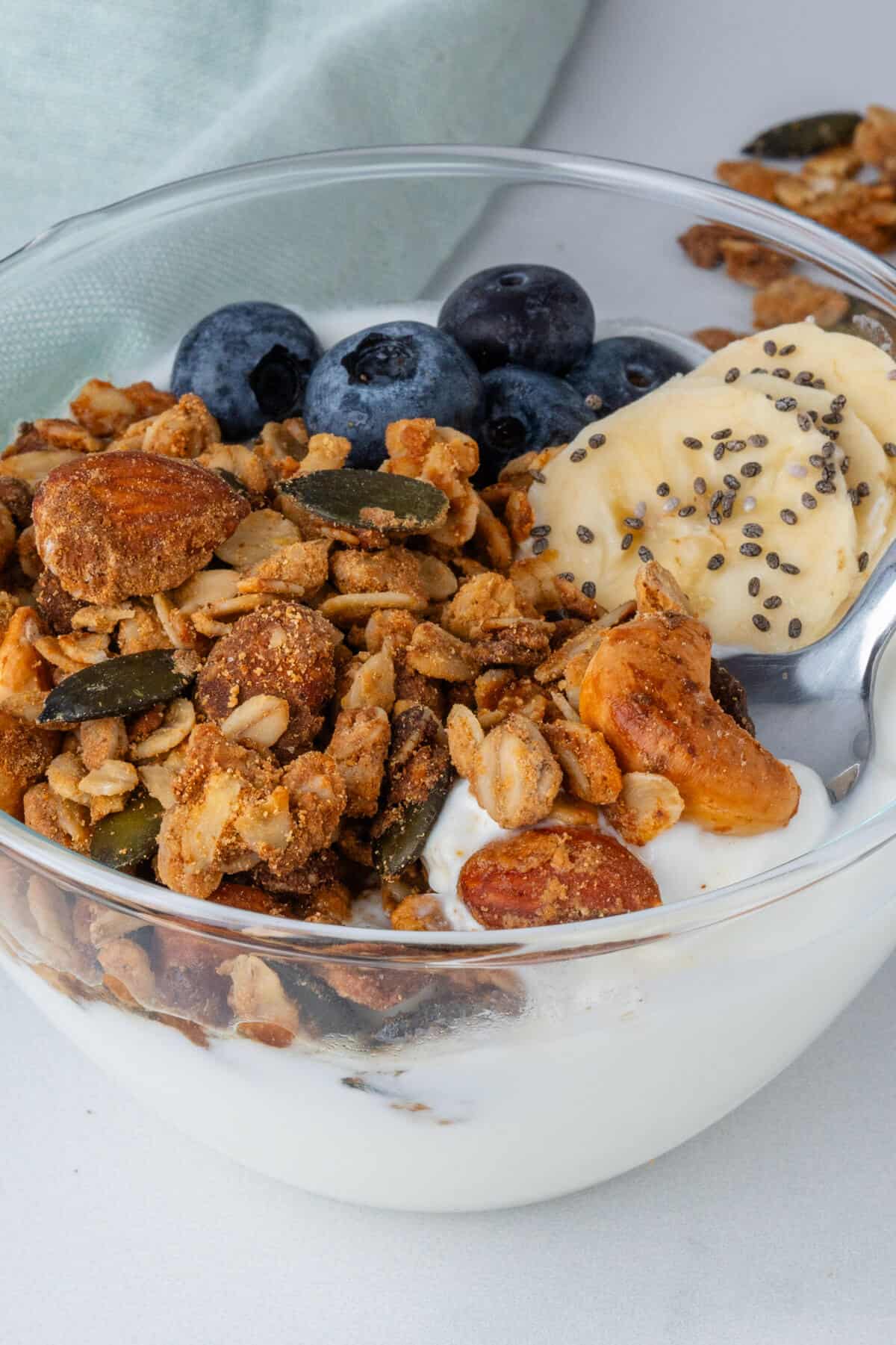 Protein granola in a bowl with yogurt and berries