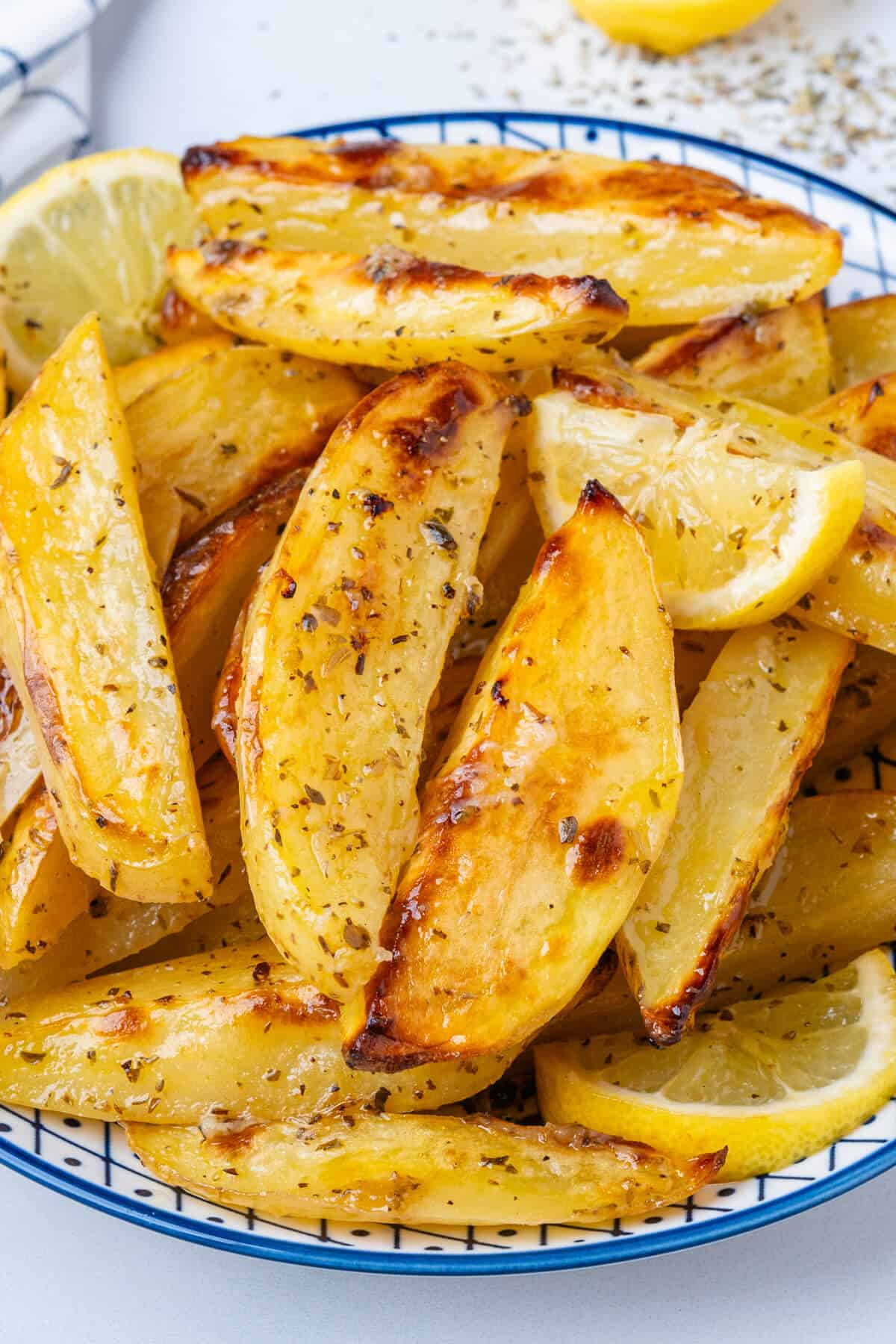 Potatoes served in a bowl with fresh lemon