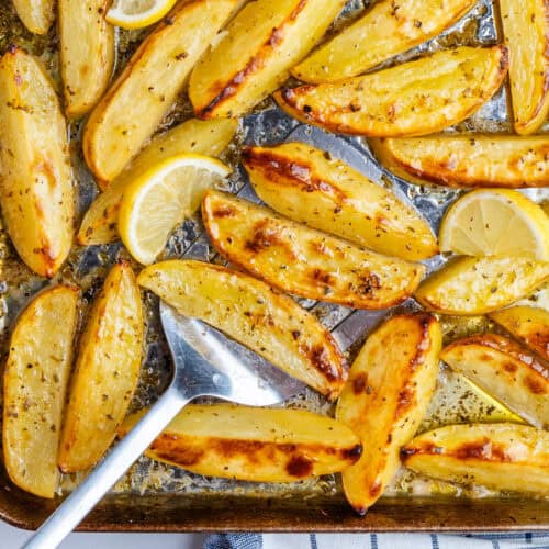 Greek Lemon Potatoes with a spatula