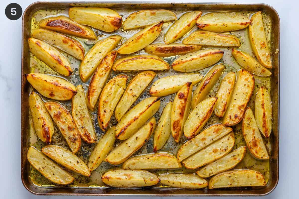 Cooked potatoes in a oven tray