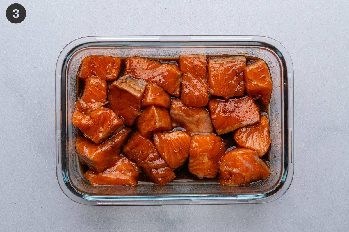 Salmon cubes in marinade