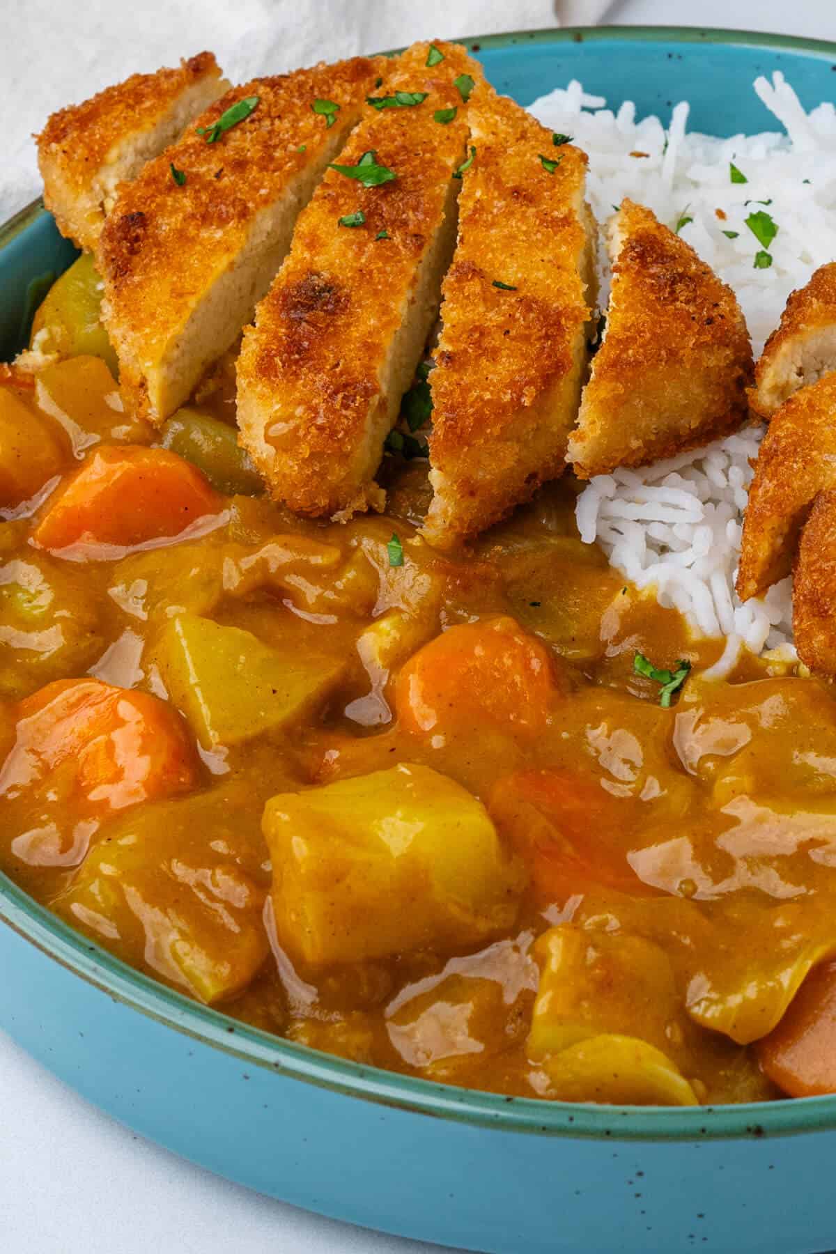 Katsu curry in a bowl with tofu katsu