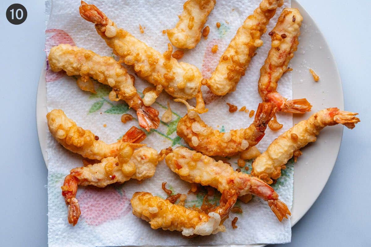 Tempura placed on paper towels to soak excess oil