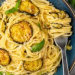 Spaghetti alla Nerano with a fork in a bowl