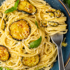 Spaghetti alla Nerano with a fork in a bowl