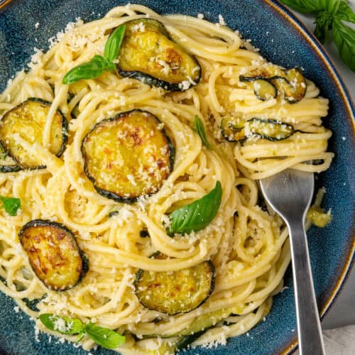 Spaghetti alla Nerano with a fork in a bowl