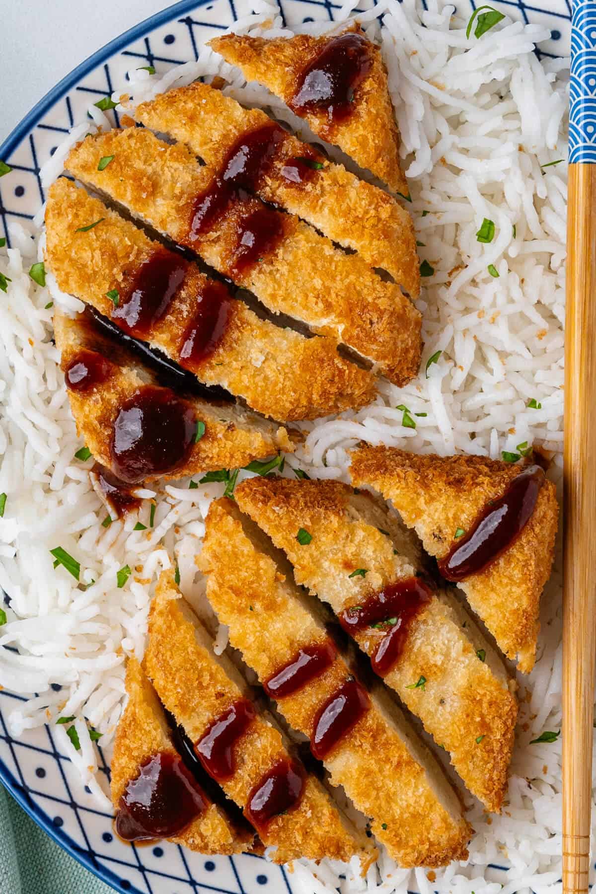 Tofu katsu topped with katsu sauce served with white rice