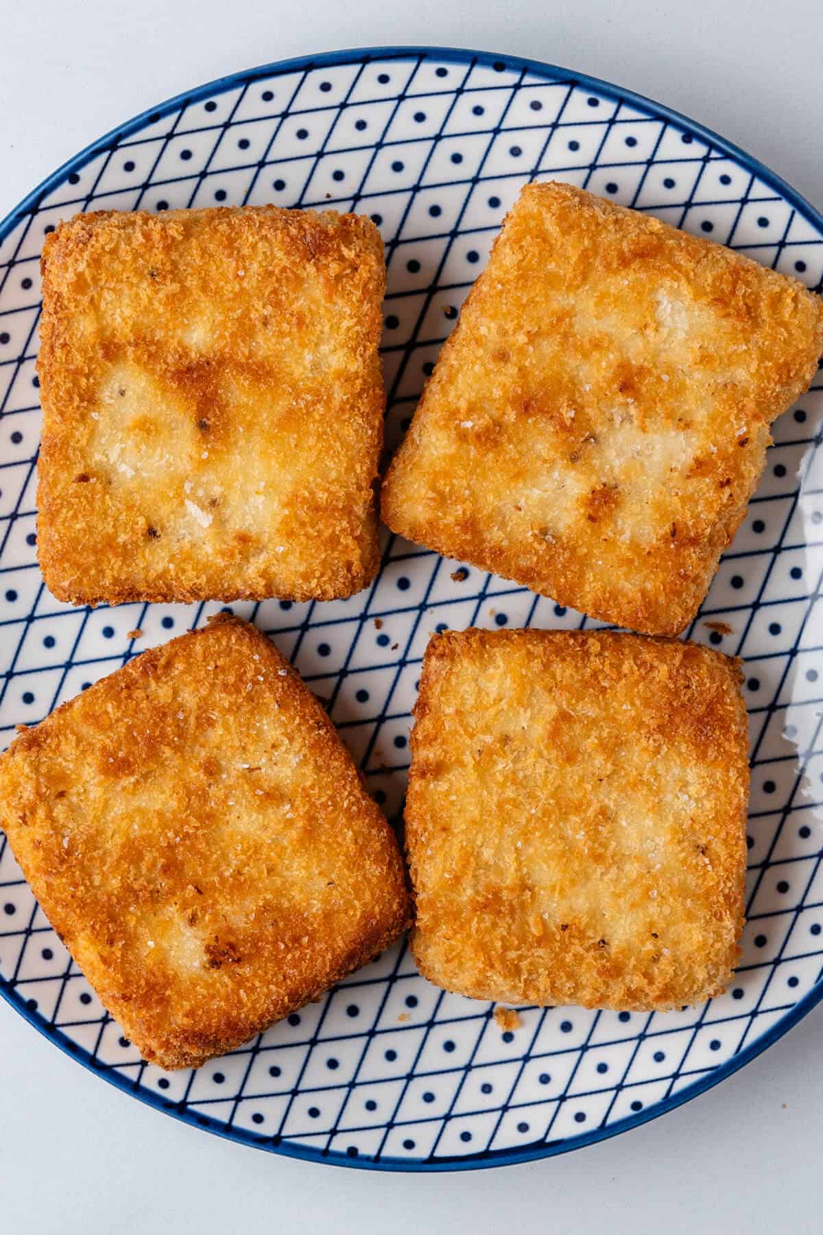 Four pieces of cooked crispy tofu