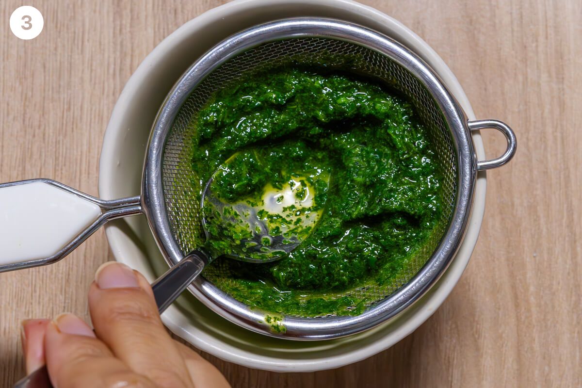 Basil oil being put through a sleeve