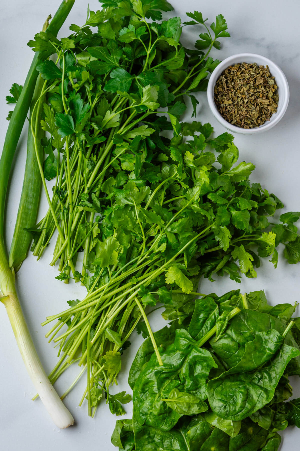 Fresh parsley, cilantro, green onions, fenugreek and spinach