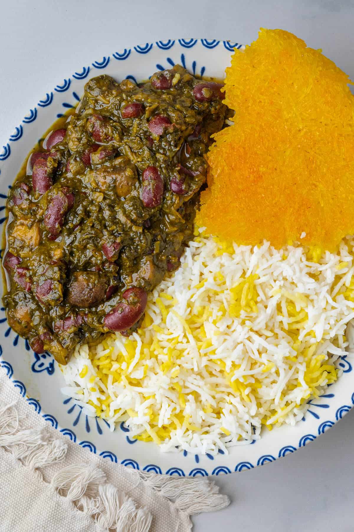 Persian Herb Stew served with rice and tahdig