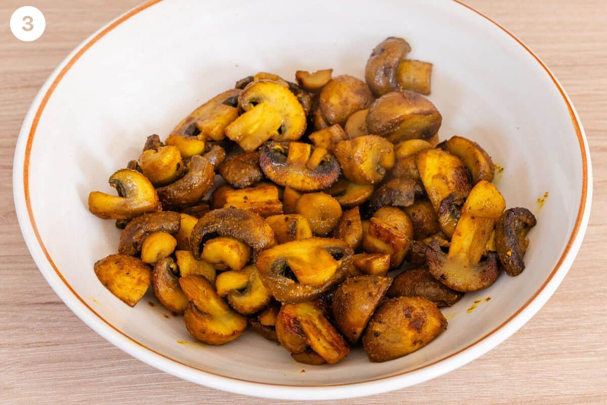 Cooked mushrooms placed in a bowl