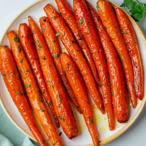 Honey glazed carrots topped with fresh parsley