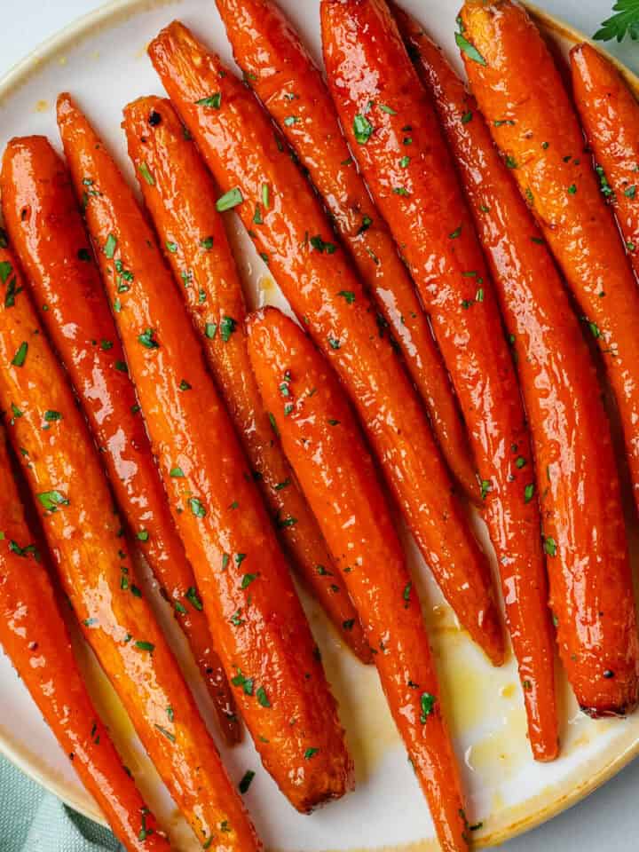 Honey glazed carrots topped with fresh parsley