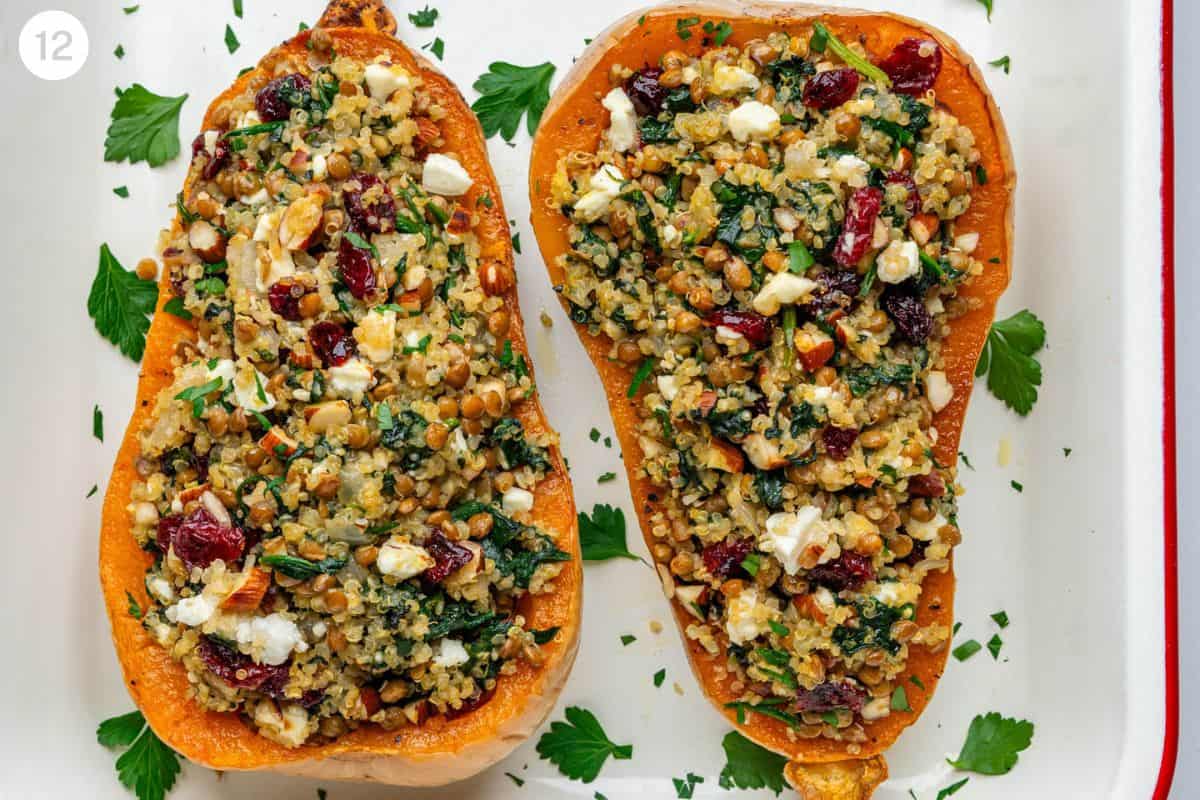 Final roasted stuffed pieces of squash on an oven tray