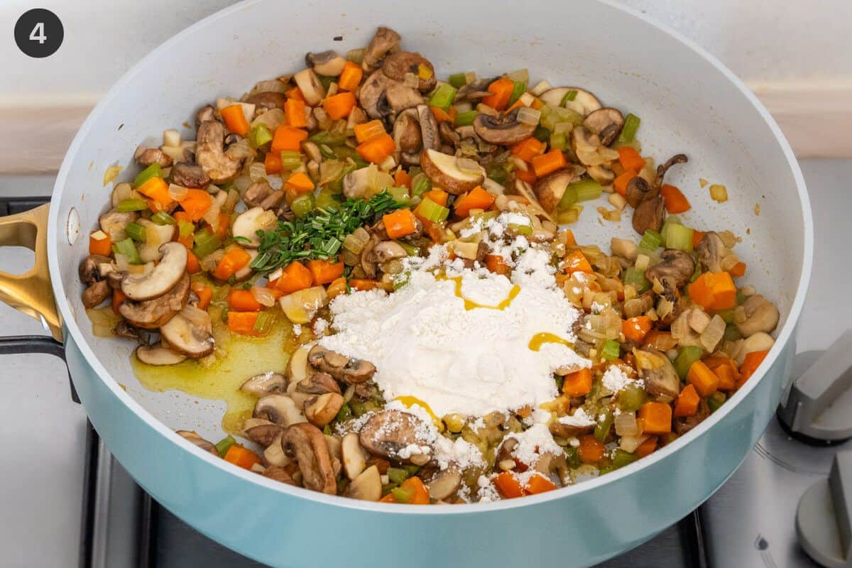 Flour and rosemary added to the pan