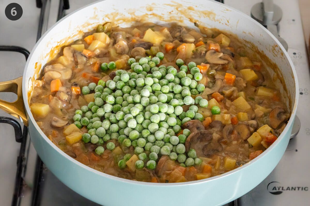 Frozen peas add to the pan