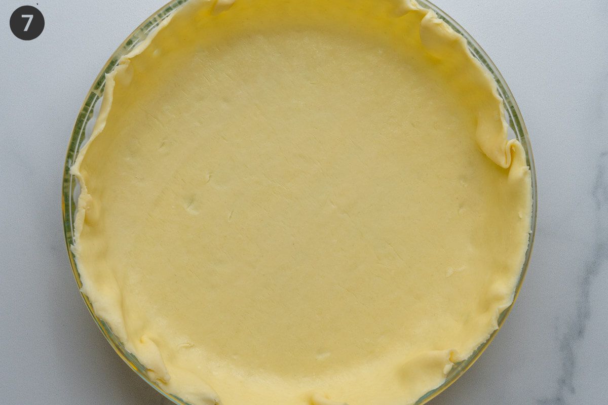 Pie crust placed inside a pie dish