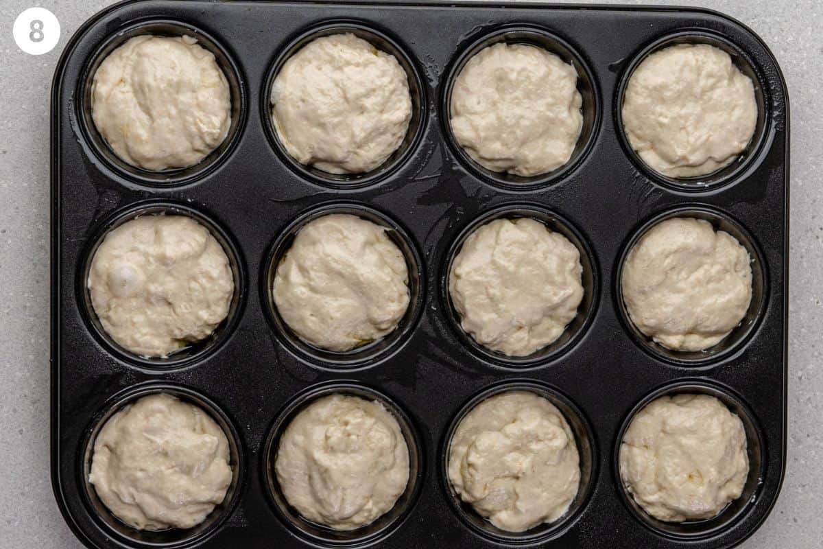 Muffin tin filled with dough