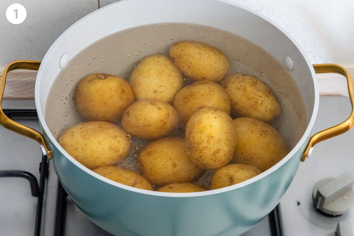 Potatoes being boiled in a large pot