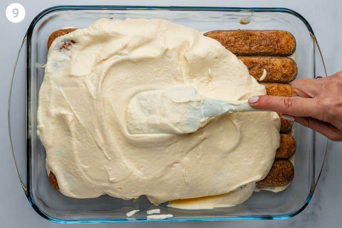 Rest of the cream added on top of the biscuits