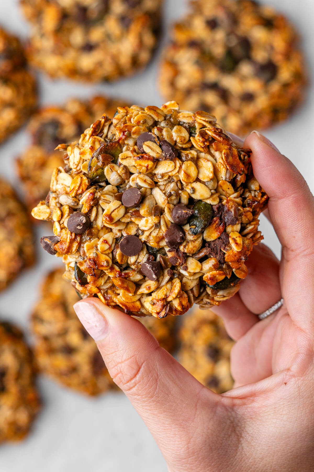 Close up of cookie being held up by hand