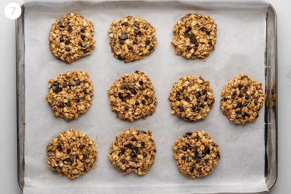 Choc chips added on top of each cookie