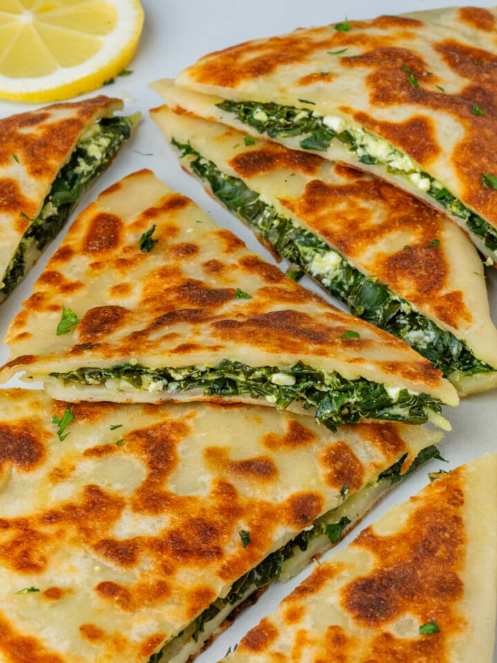 Gozleme with spinach and feta filling and lemon on the side