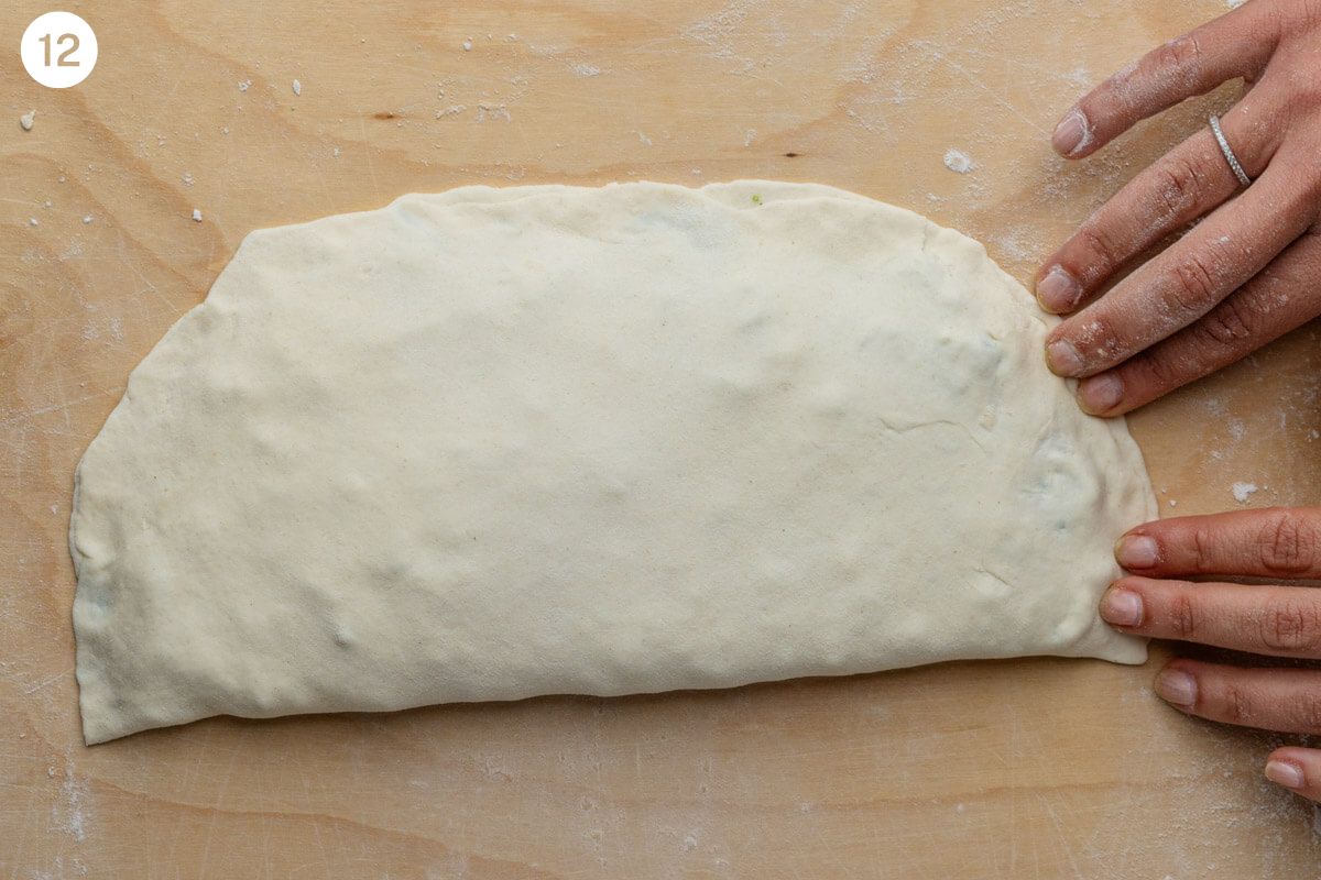 Dough folded over and closed with fingers