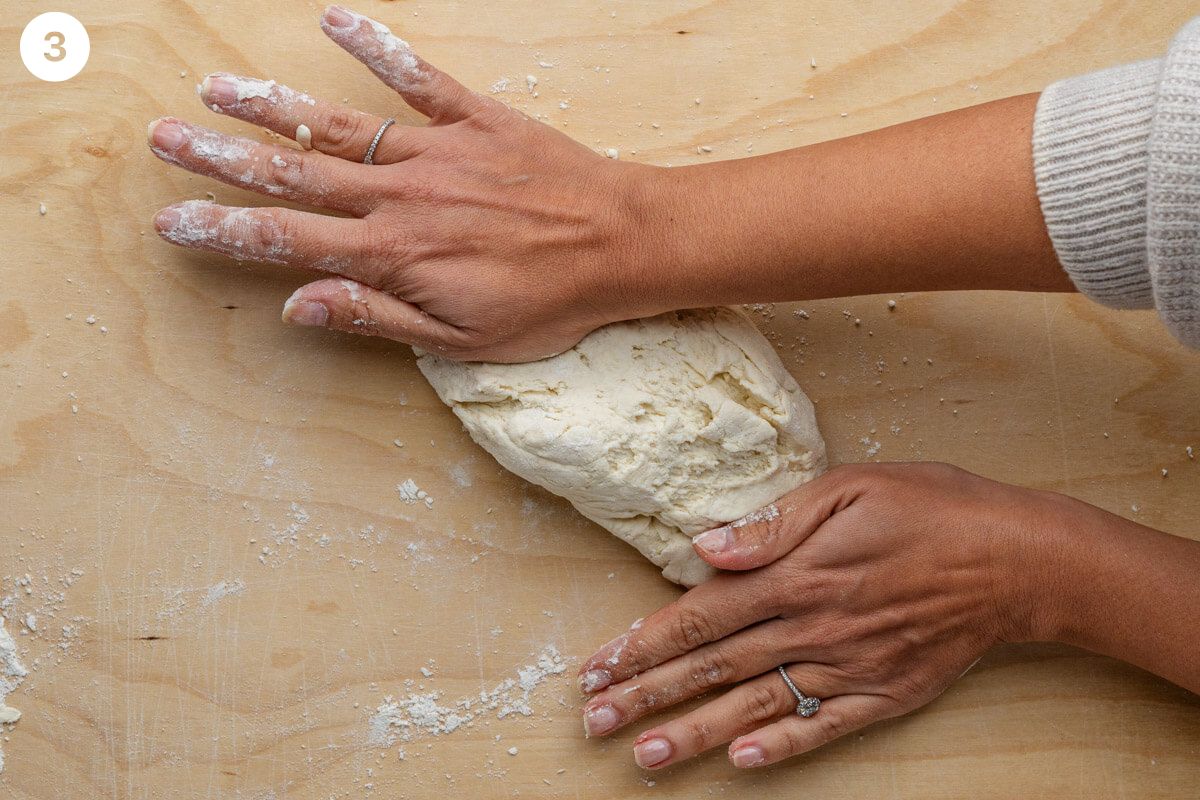 Kneading the dough on flat surface