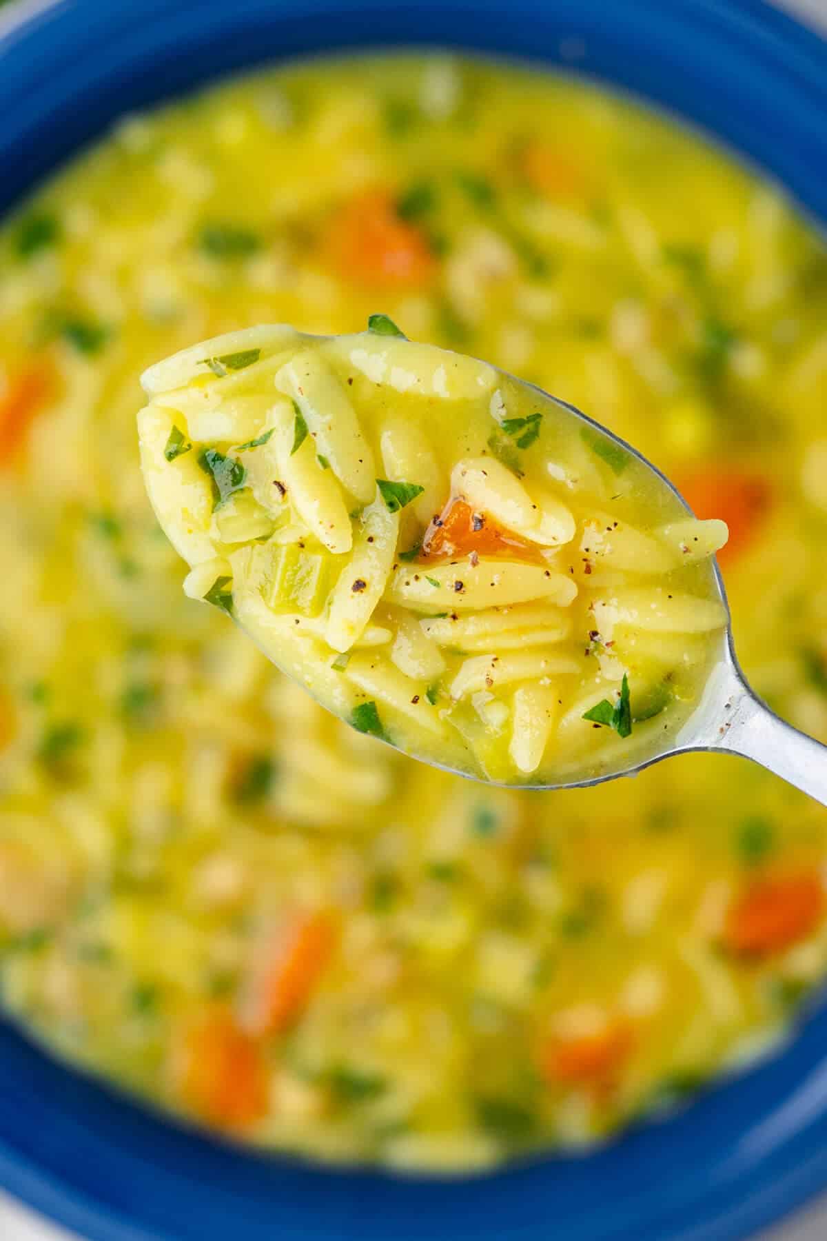 Close up of soup on a spoon