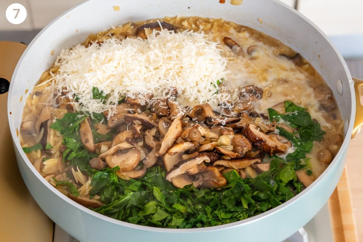 Cheese, spinach and mushrooms added in pan