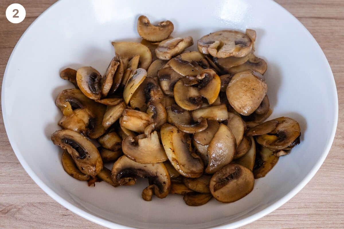 Mushrooms sautéed and place in a bowl