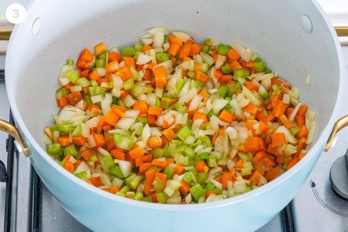 Celery, onions and carrots sautéed in a large pot