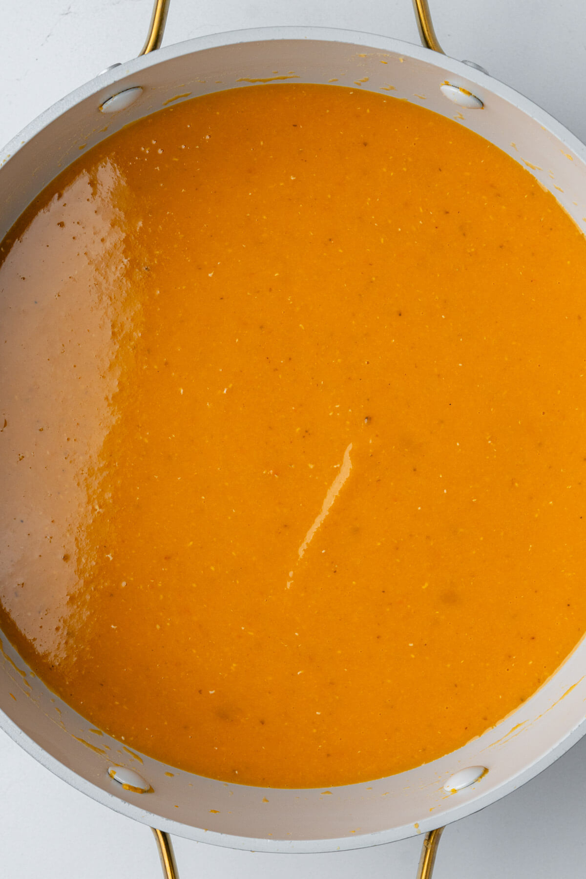 Large pot of lentil soup after being blended