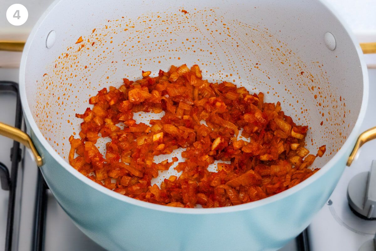 Tomato paste being fried down