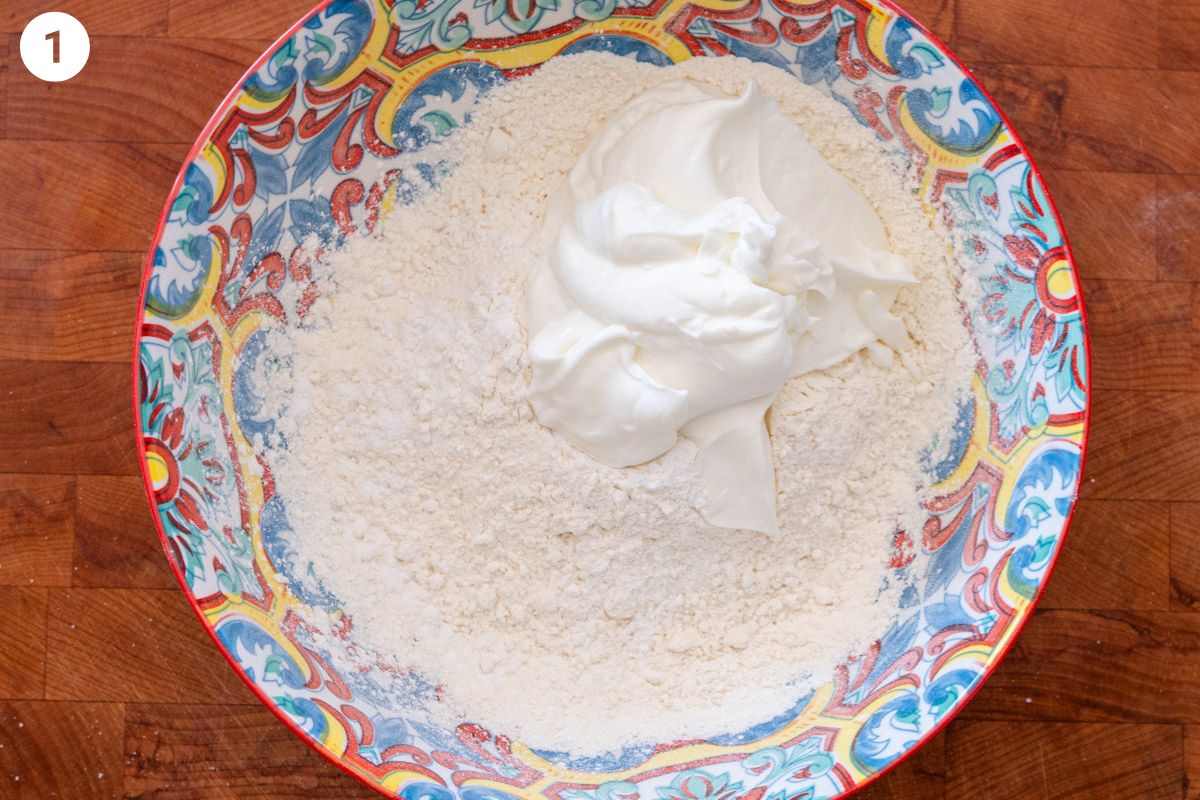 Flour and yogurt in a bowl to make protein bagels