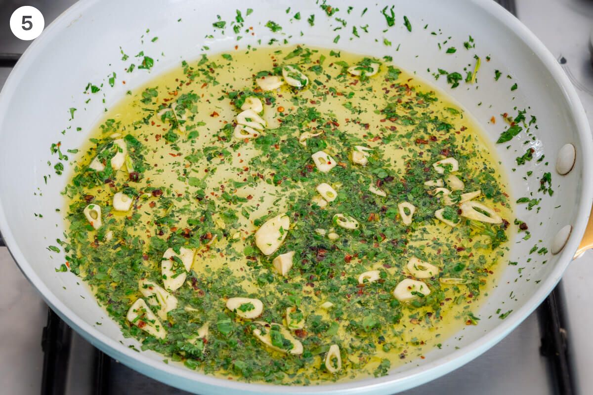 Fresh parsley added to the pan