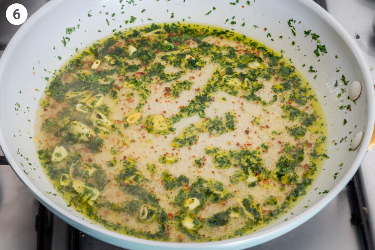 Pasta water added to the pan