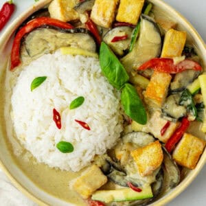 Bowl of thai green curry with jasmine rice